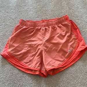 orange Nike dri-fit shorts